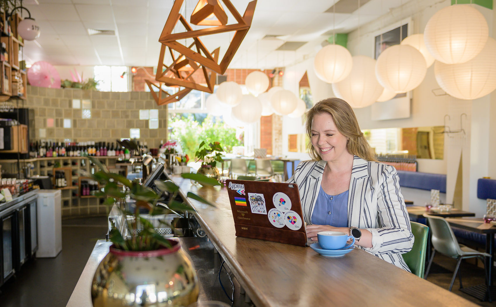 Picture of Donna working at a coffee bar